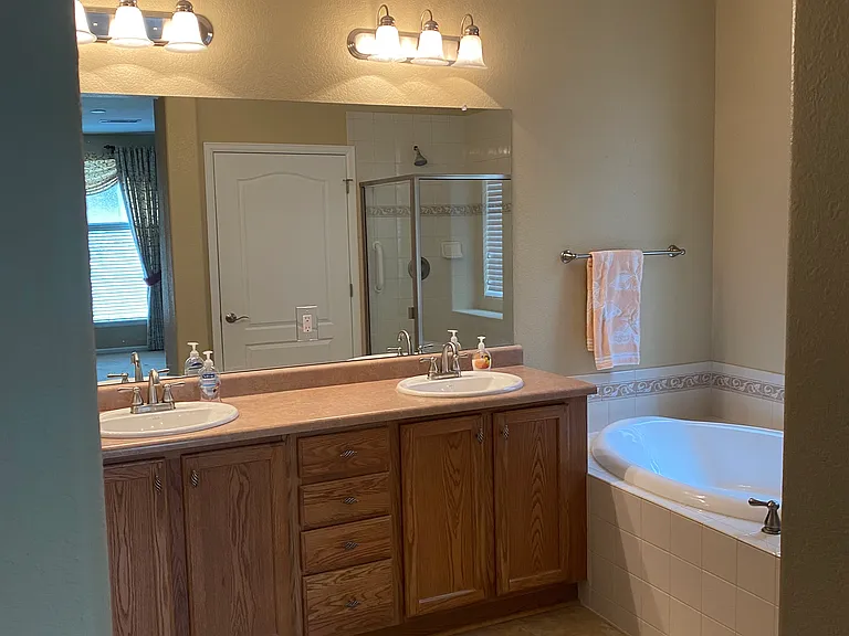 Master bath with a soaking tub.