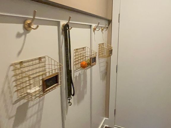 Floor 1: Garage Entry w/ Built in drop station