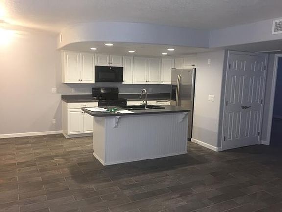 Open Kitchen with Island and separate dining area