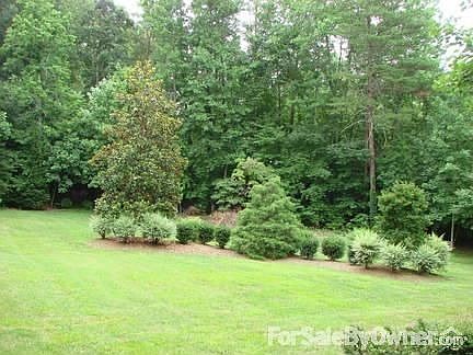 Dining Room View : This home has glass! From the front bay window, entertain with complete privacy.