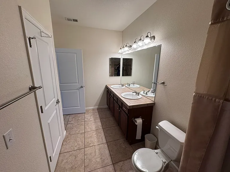 Master Bathroom, includes two sinks and a walk-in shower