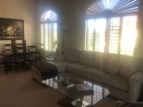 Beautiful white wood plantation shutters throughout unit! New Top end beige carpet throughout unit, with extra comfy padding underneath, big square stone tile in kitchen and both bathrooms, walk in closet in Master Bdrm with double sinks in Master Bath