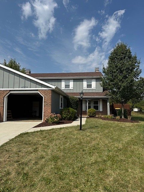 Your windows look out at the front. Garage, yard, private patio.