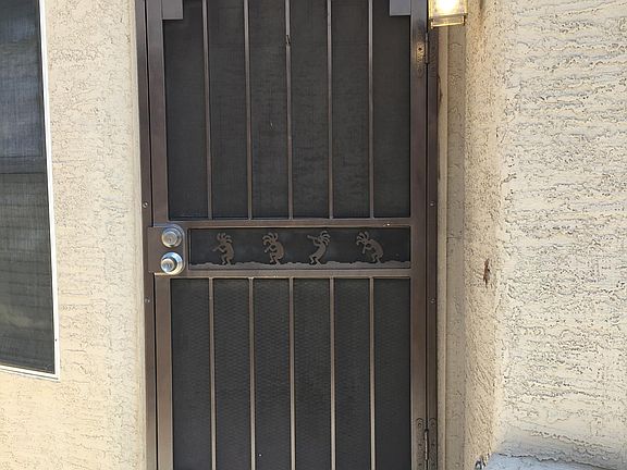 The front door has a security door so you can enjoy our beautiful weather.