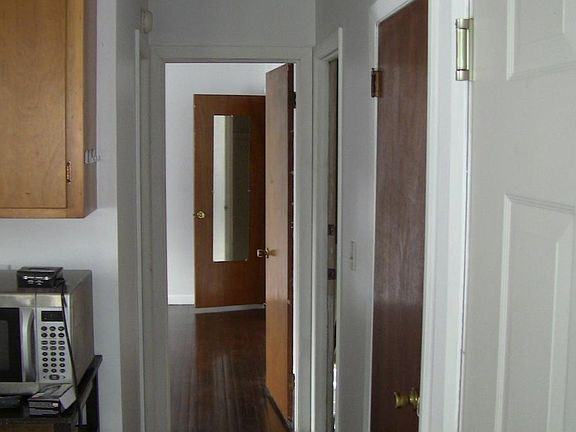 Hallway to bathroom and bedroom
