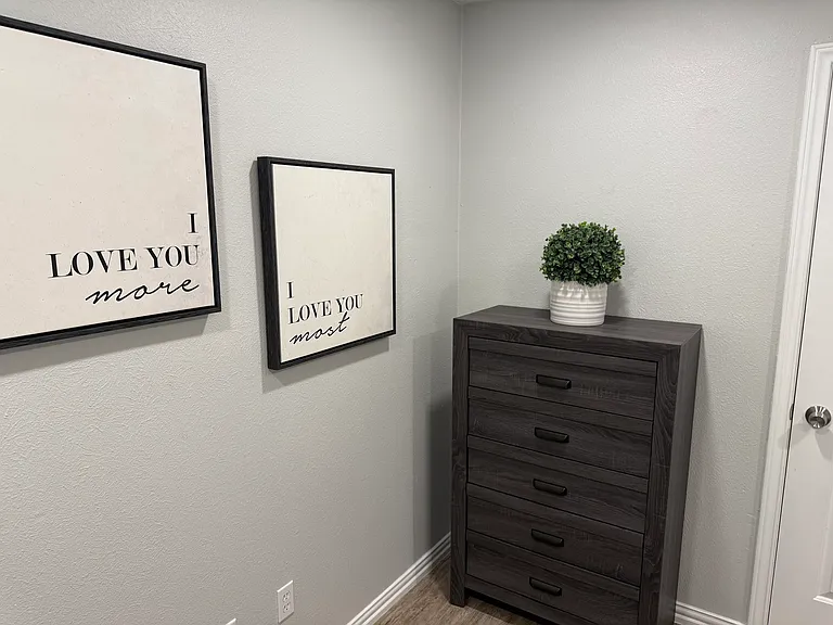 Bedroom 2 - a queen bed and smart tv.