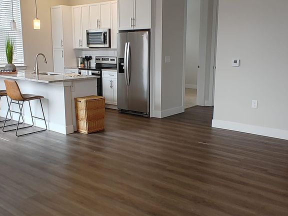 Open floorplan with plank flooring