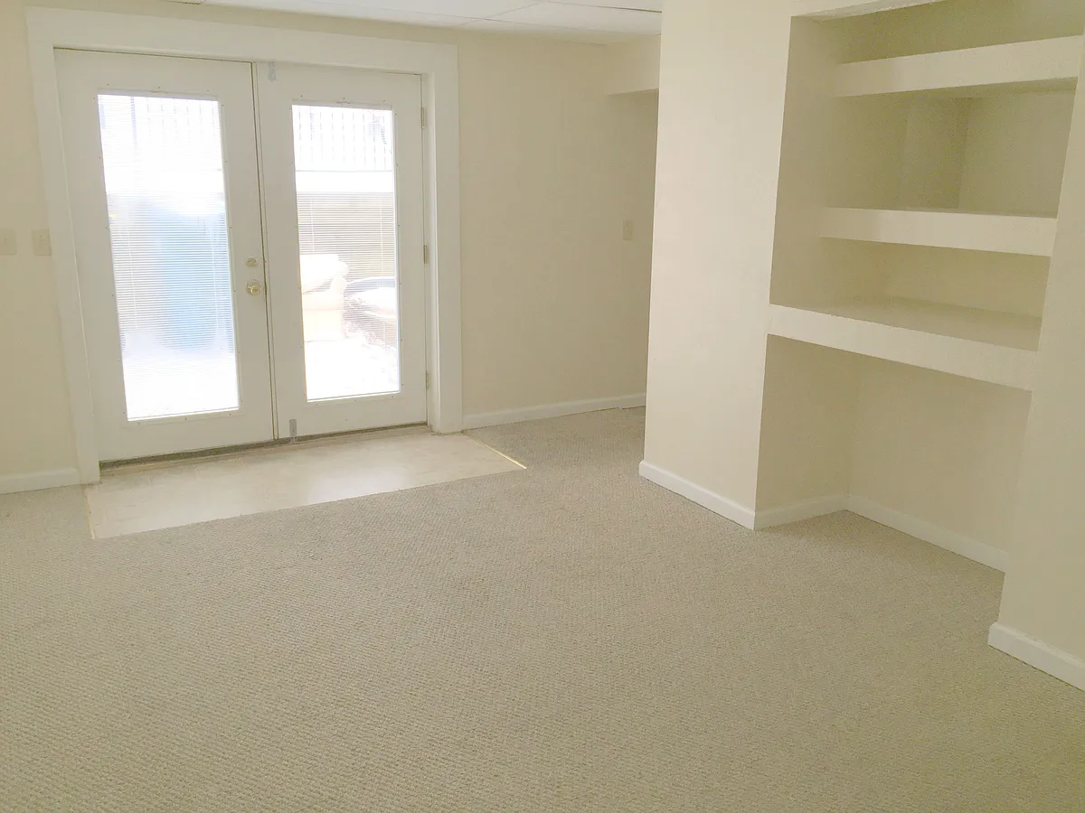 Expansive main living area features built in entertainment center. - 329 M St #B