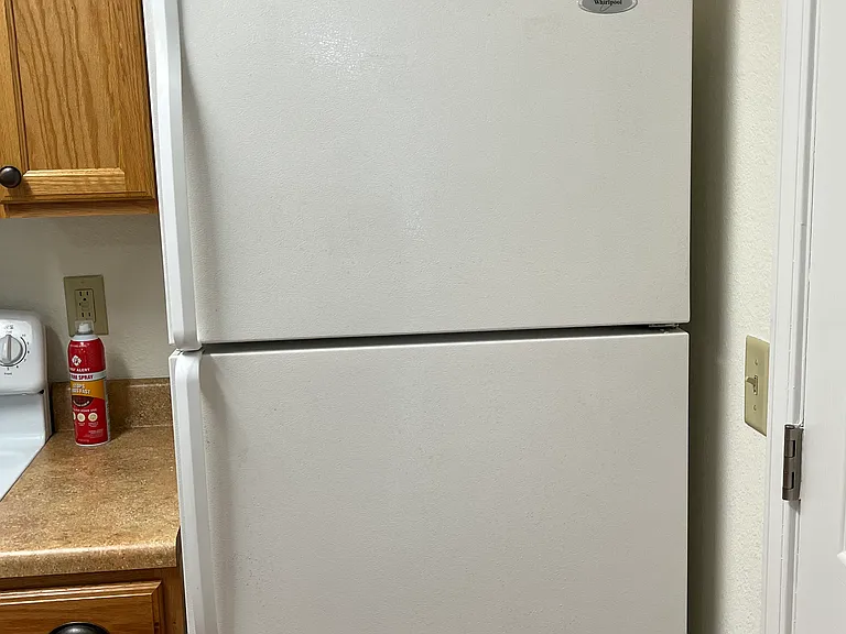Full sized refrigerator with ice maker