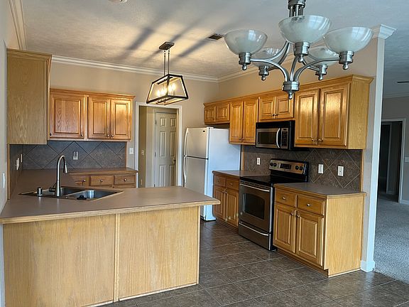 Kitchen with large dining area and pantry