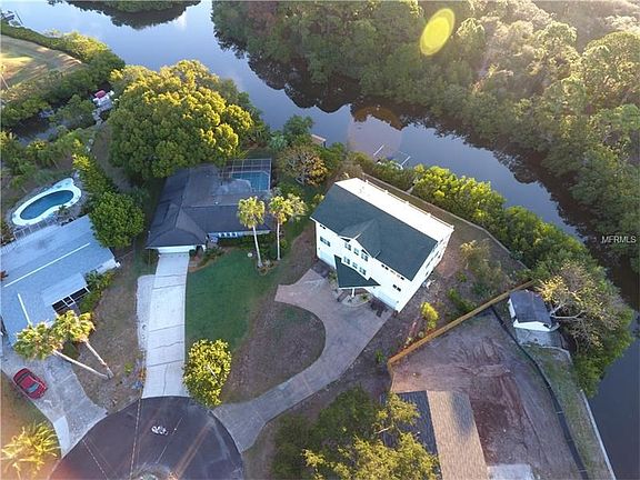 Overhead view of waterfront leading directly to Gulf. Home on a cul-de-sac
