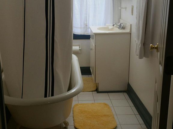 Bathroom with claw foot tub 