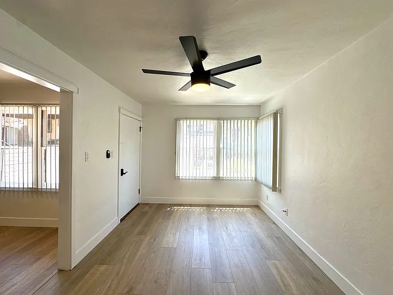 Living room with part of dining room