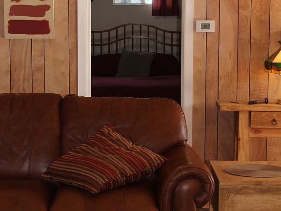 Entrance to the first bedroom is off of living room.