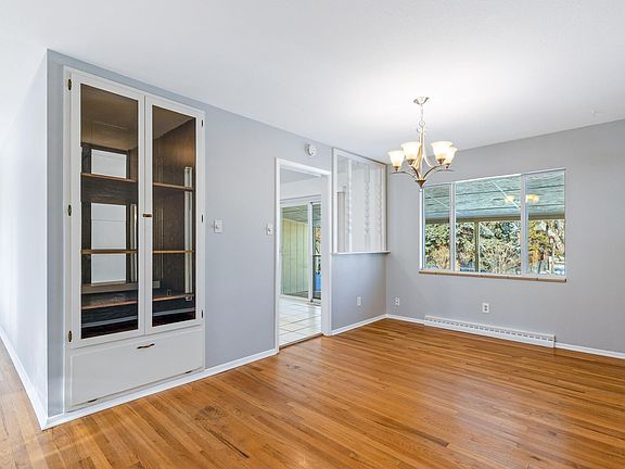 Dining Room and additional pantry for kitchen items or showcase dishware