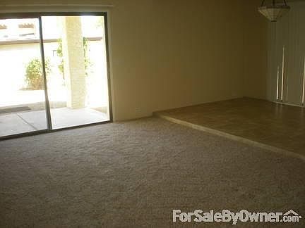 Large family room with access to rear patio and back yard
