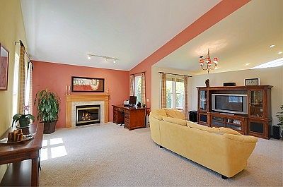 Enter into a light filled, spacious and open living area. The formal dining room to the right is cur