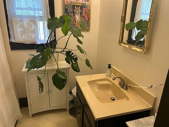 Bathroom with tub and shower.