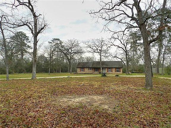 Country living close in with mature trees and privacy. Home is tucked in among great Oak trees and is fully fenced.