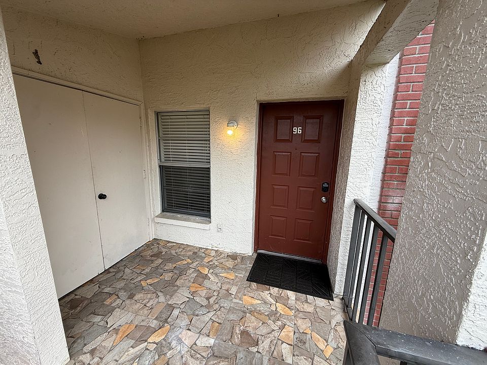 Front door entrance to Condo #96 and to the left is the Laundry Room
