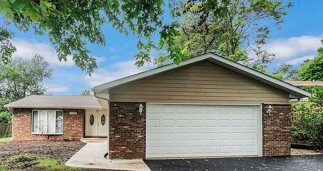 Lot size is .36 acres.  New Driveway, concrete walkway, roof and Hardie Board siding.  Exterior freshly painted.