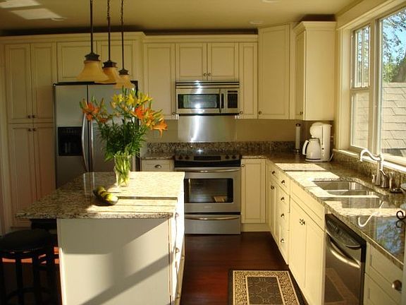 granite slab, maple cab, top of the line appliances