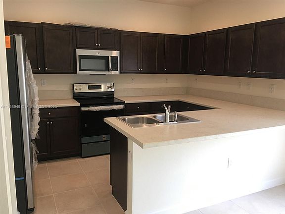 5th image of 9223 W 22nd Ln #9223