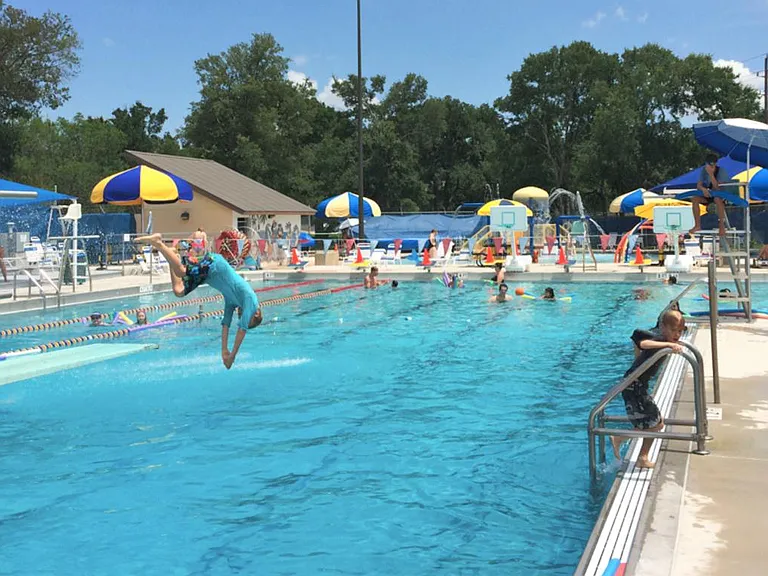 Community Pool Outside the Neighborhood Features Beach End, Splash Pad. Heated in Cold Weather Months