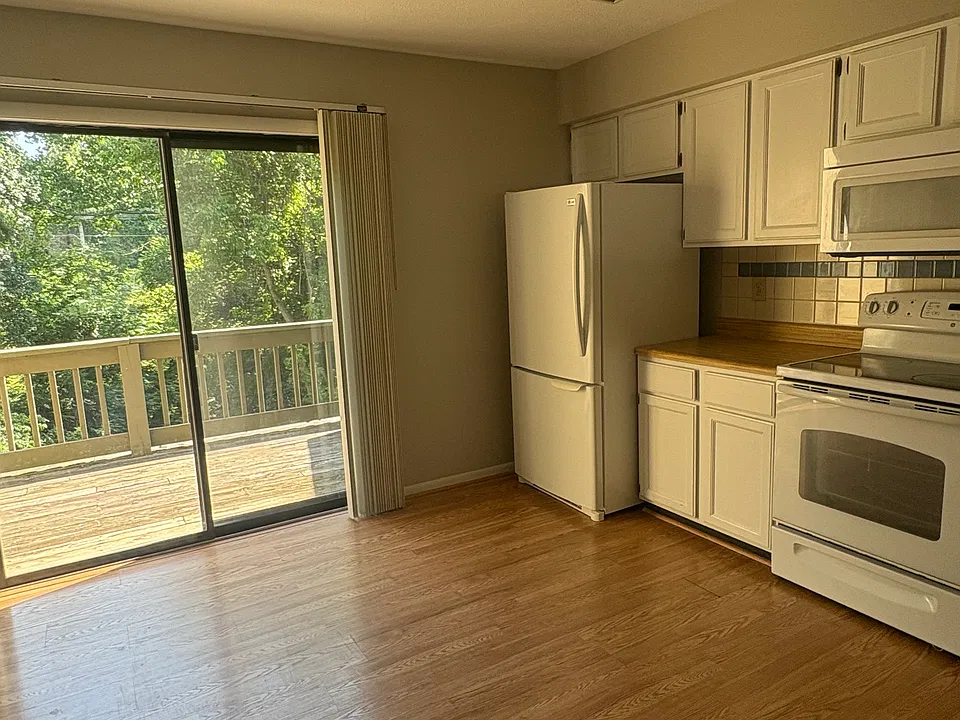 Kitchen with patio doors leading to deck