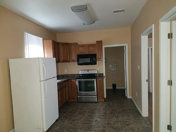Kitchen (fridge does not come with rental property only stove).