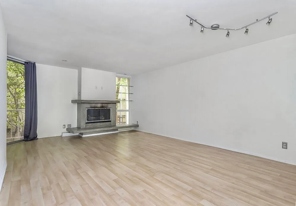 Building Photo - 1230 N Sweetzer Ave #111