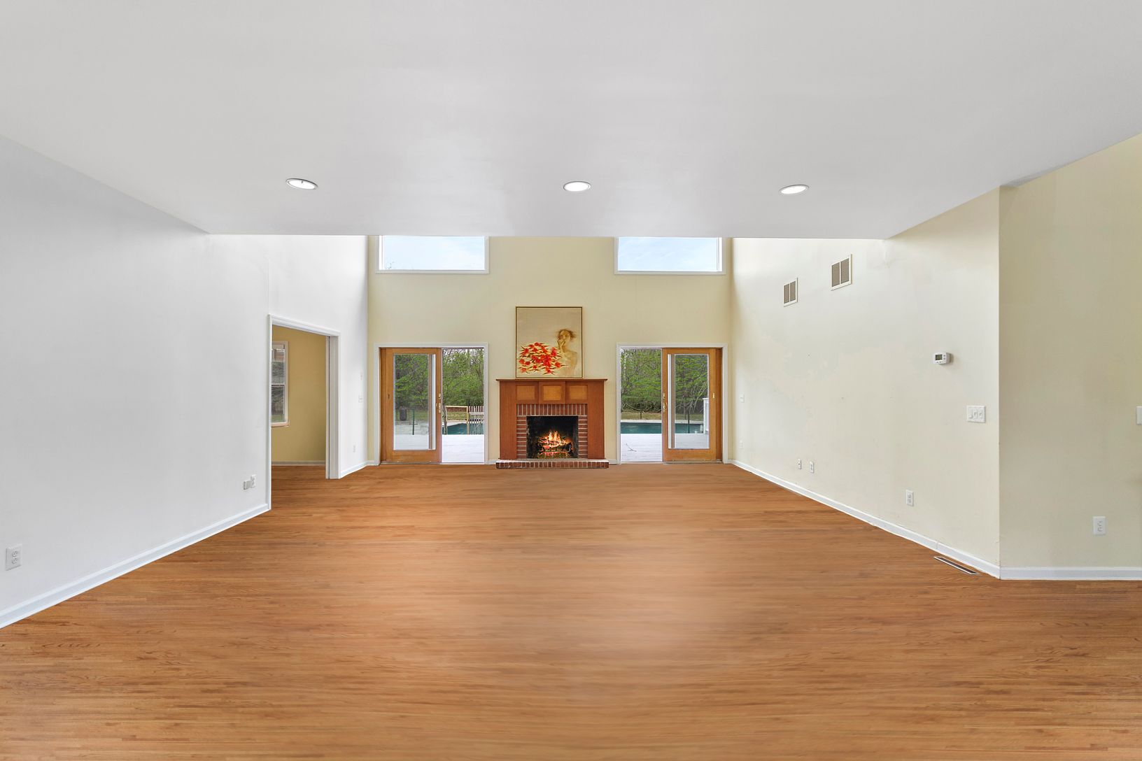 Living Room w/wood burning Fireplace