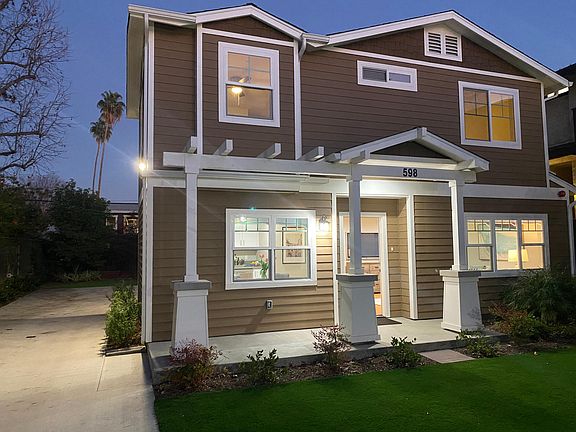 New Town Home at the rear of the lot with Private Backyard and attached 2 car garage. Rare Find.