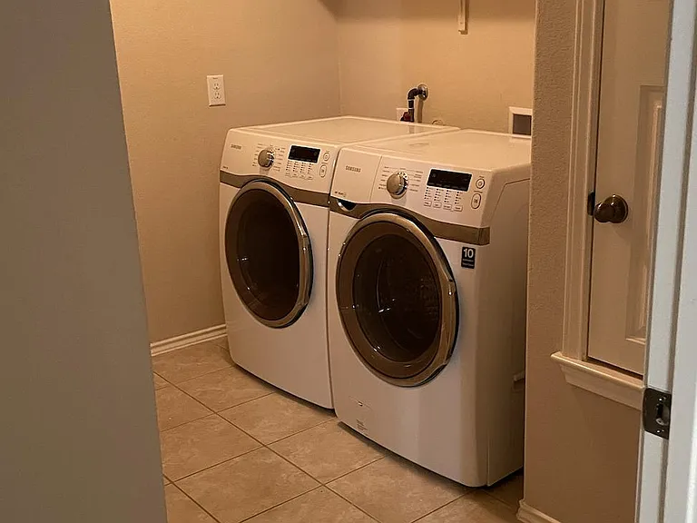 Utility Room w/ Washer and Dryer