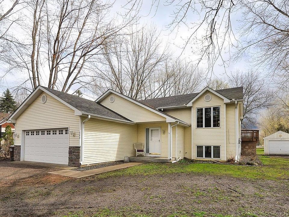 Maintenance Free siding!  New garage door. Heated and insulated garage too!