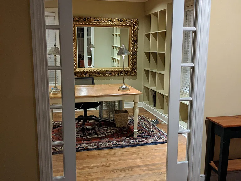 Downstairs Office 12ft x 18ft - with Built-in Shelfs, next to Large Laundry Room with Washer & Dryer, Large cabinets and Work Counter