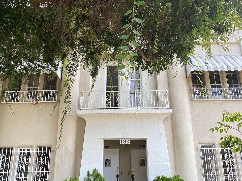 This is the front of the apartment building. Unit is located on the second floor (1818 1/4). Unit is pictured on the left.