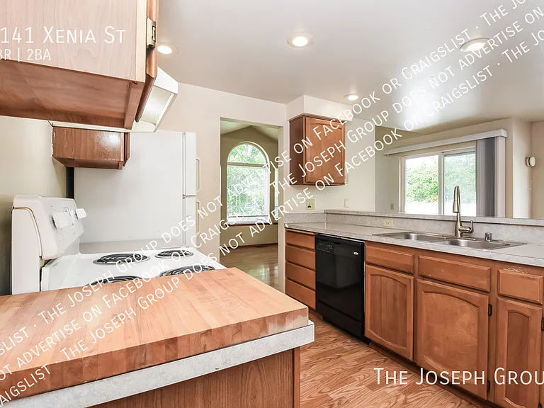 2141 Xenia St — Photo 7