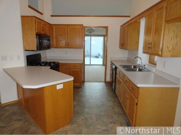 5th image of 618 100th Ct NE