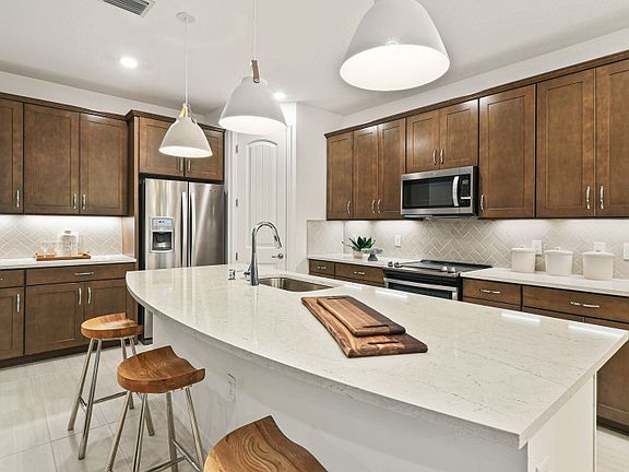Kitchen with Large Island Overlooking Gathering Room