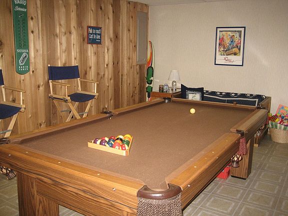 No water front home is complete without a game room and wet bar.