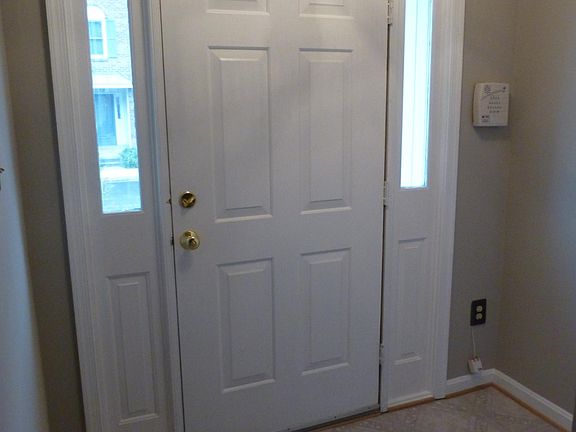 Main entrance on 1st floor, across from assigned parking spot.