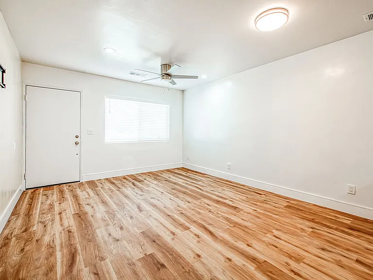 Family Room: TV Mount & Ceiling Fan, LED Lighting, LVP Flooring, Central Heating & Cooling, New Windows.