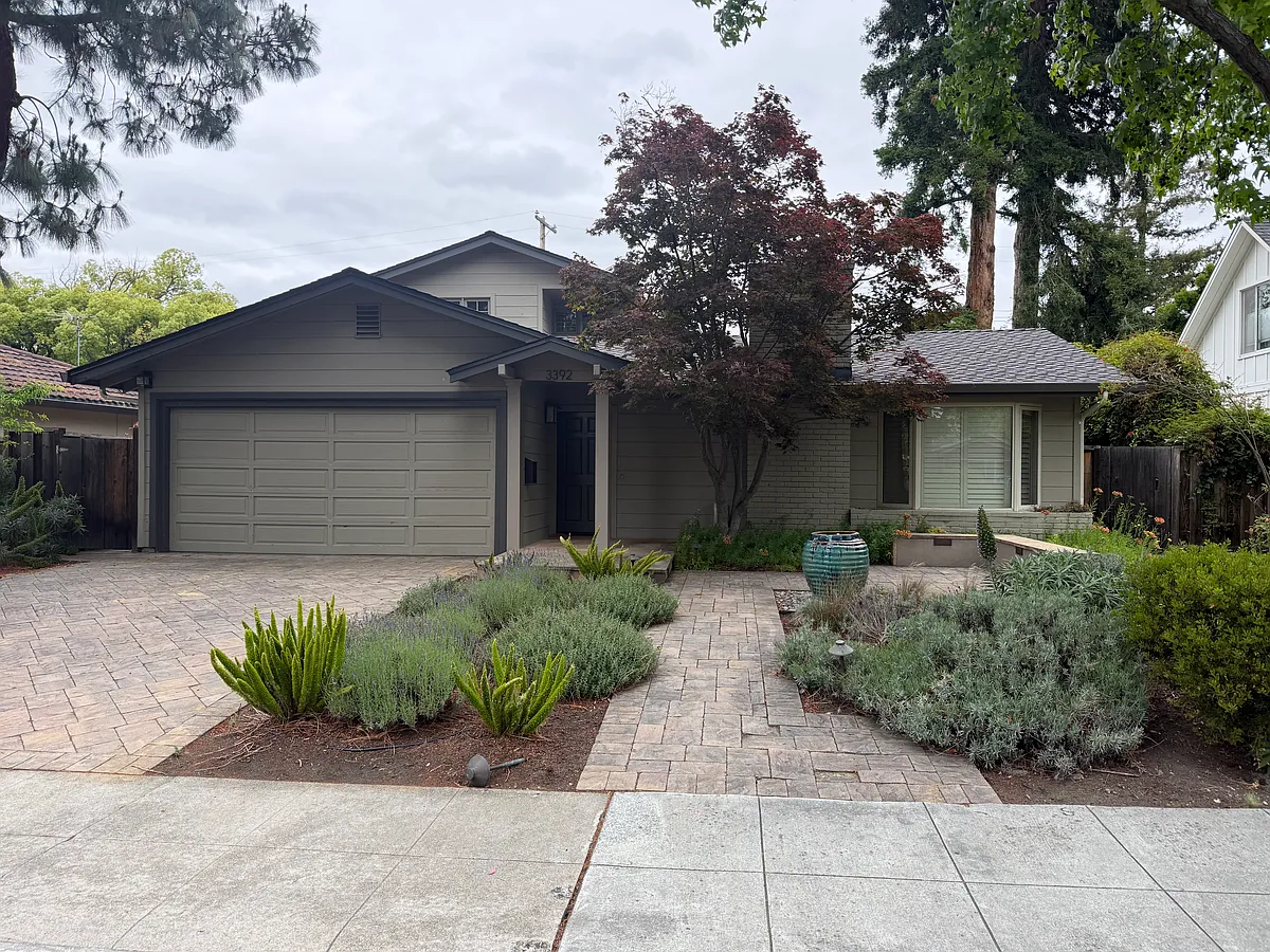 This charming home is an oasis situated on a quiet tree-lined street surrounded by manicured lush landscaping and majestic trees. - 3392 Saint Michael Dr