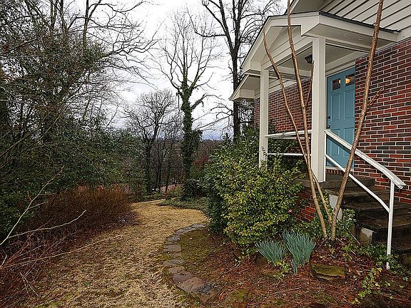 Stones lead up to side door
