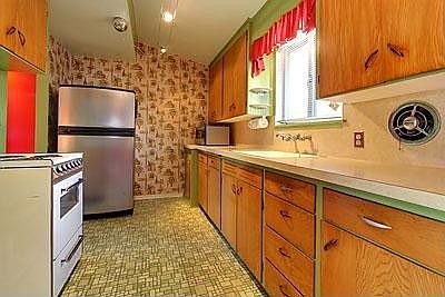 The orginal cabinet doors remain unpainted.