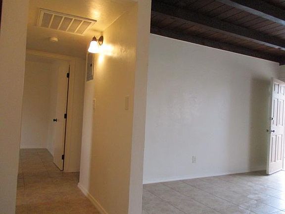 living to back bedrooms