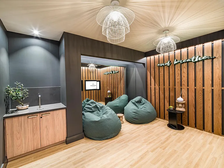 Recharge in the tranquil meditation room at Modera St. Paul, designed for relaxation and mindfulness in the center of downtown Dallas.