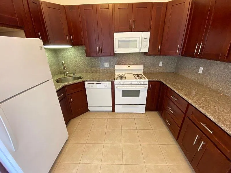 Large kitchen with granite counter top, new cabinets. newer appliances, plenty of counter space, lighting and multiple outlets for all your appliances.