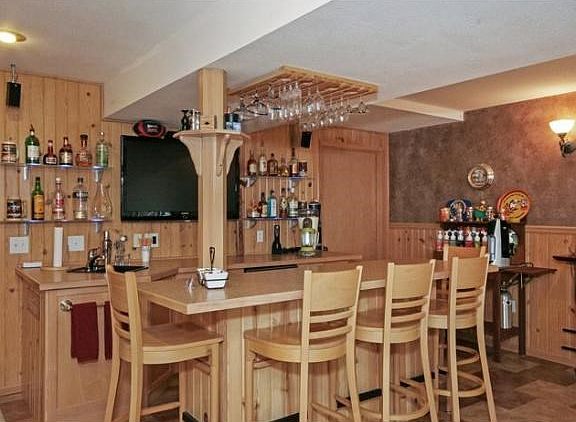 The wet bar is a perfect gathering spot - very bright and sunny with southern exposure.
